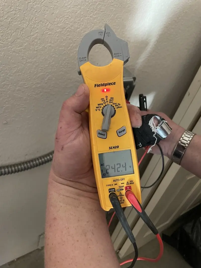 Voltage testing with clamp meter during Hot Tub / Pool Electrical Wiring in North Augusta